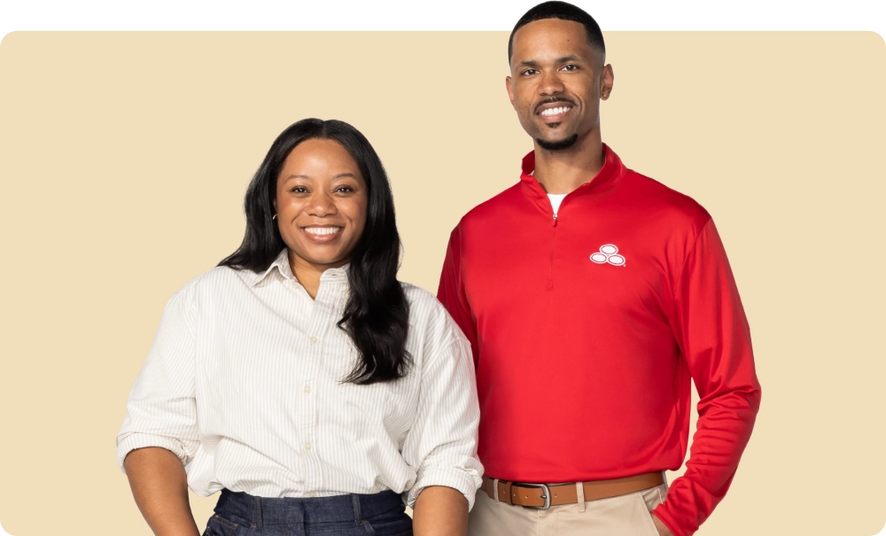 an agent standing next to an employee