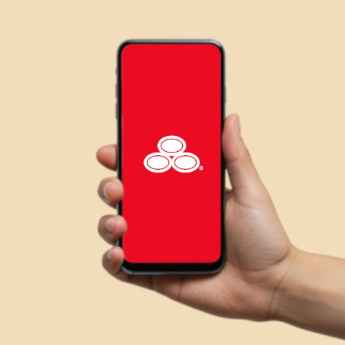 a hand holding a smartphone running the State Farm app