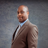 Profile photo of a State Farm Agent named: Alex Umo-Etuk