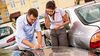 Drivers are filling out an accident report.