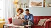 Couple reviewing auto insurance quote.