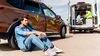 Man sitting on ground after causing an accident with ambulance in background.