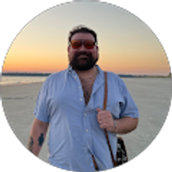 Profile photo of Tommy Denoma