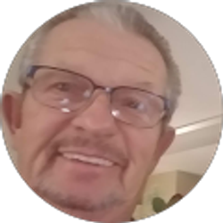 Profile photo of John “SKUZ”