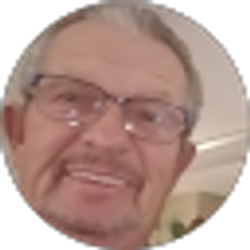 Profile photo of John “SKUZ”