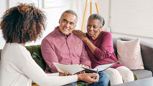 Couple discussing estate planning.